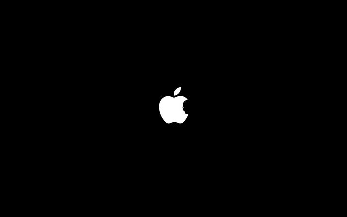 Apple logo with Steve Jobs silhouette
