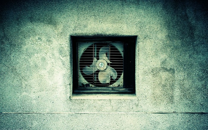 Exhaust fan in a concrete wall