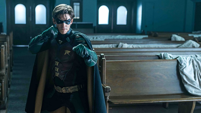 Robin from Titans in a church
