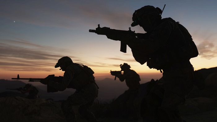 Soldiers in silhouette at sunset
