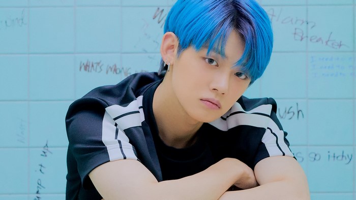 Yeonjun from TXT with blue hair
