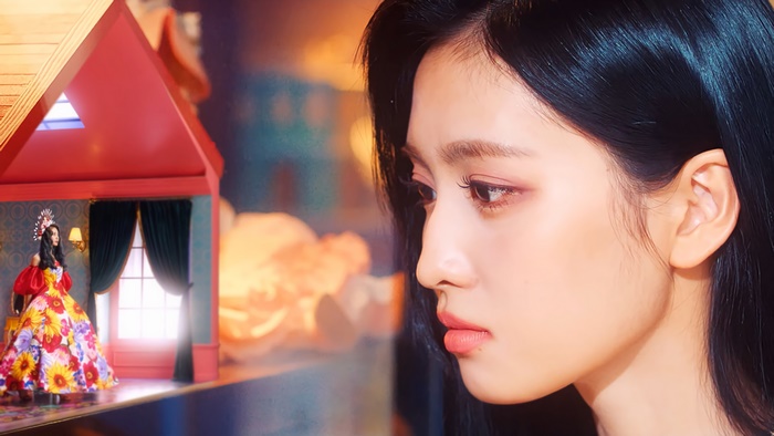Momo from TWICE in a dollhouse setting