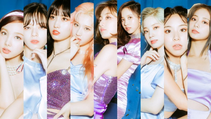 TWICE members in pastel and purple outfits