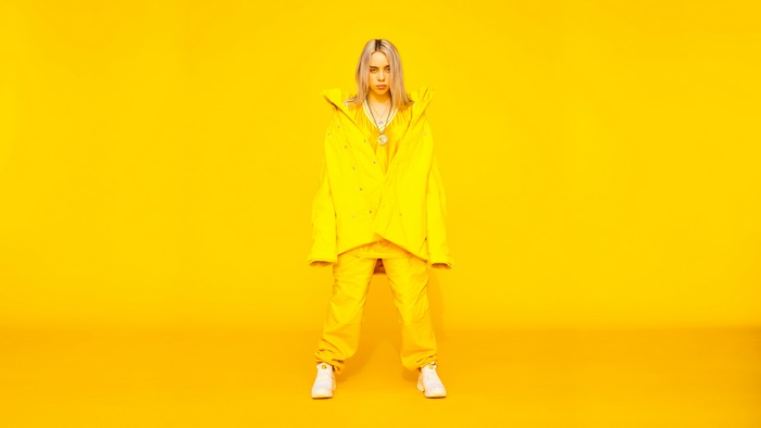 Billie Eilish in yellow outfit