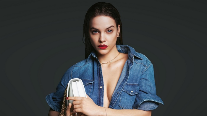 Barbara Palvin in Denim Shirt with White Purse