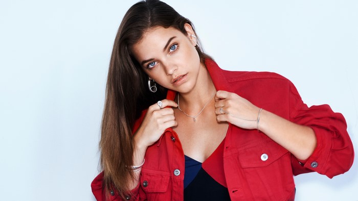 Barbara Palvin wearing a red jacket
