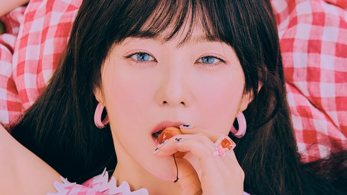 Irene from Red Velvet with a cherry