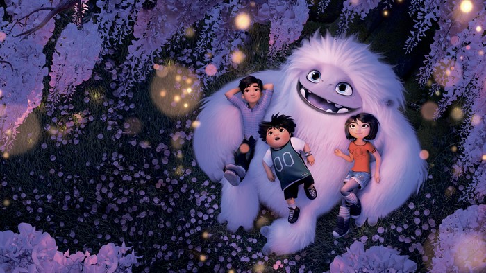 Yeti and children in a magical forest