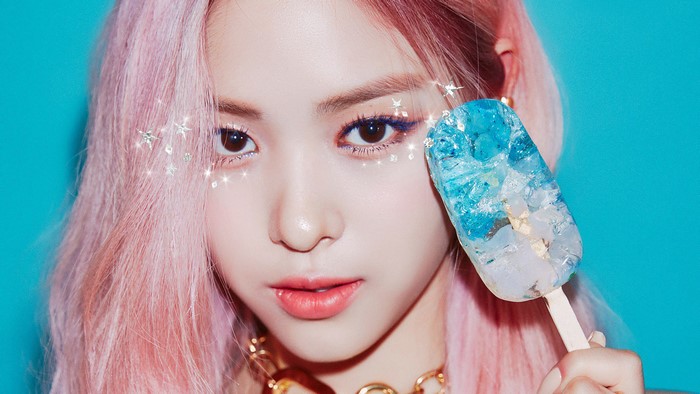 Ryujin from ITZY holding a popsicle