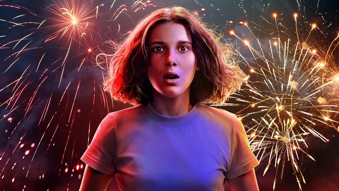Eleven from Stranger Things with fireworks