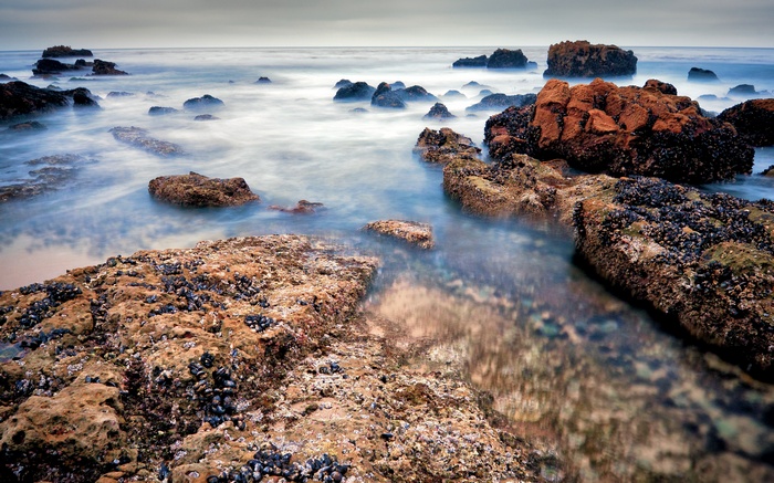 Rocky coastline with waves crashing