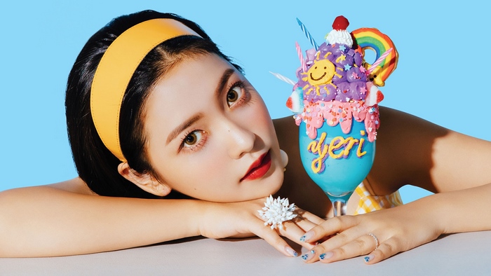 Yeri from Red Velvet with a colorful dessert