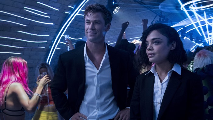 Chris Hemsworth and Tessa Thompson in a nightclub