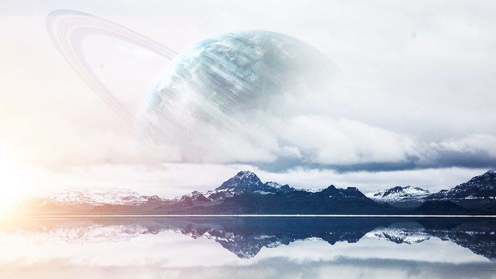 Planet with Rings over Mountains and Lake