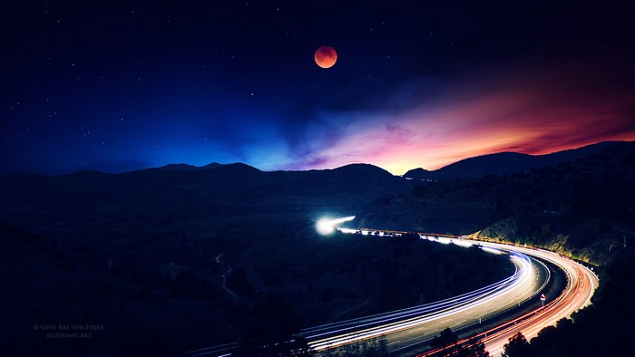 Blood Moon over a Winding Highway at Night