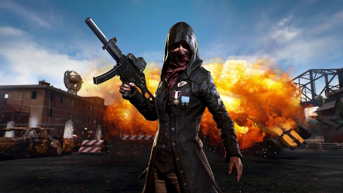 PlayerUnknowns Battlegrounds character with rifle and explosion