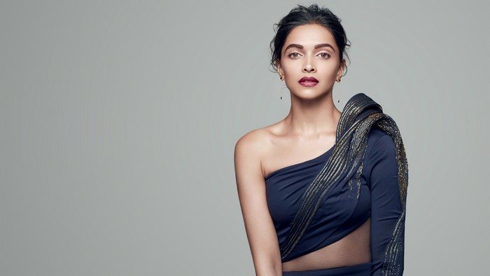 Deepika Padukone in a navy blue one-shoulder dress