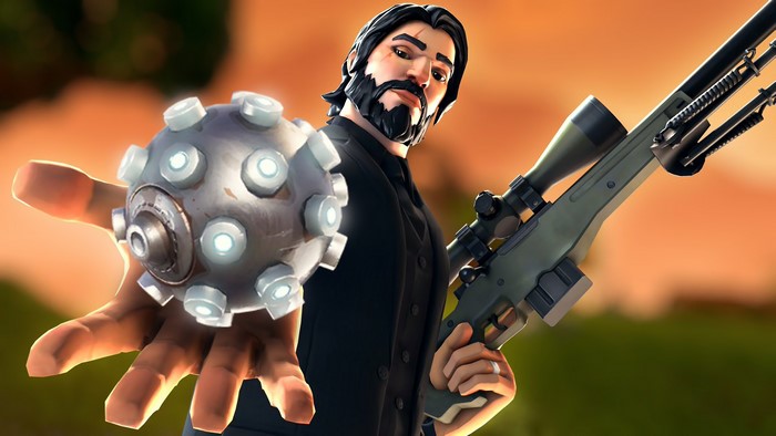 Reaper from Fortnite Battle Royale holding a grenade and sniper rifle