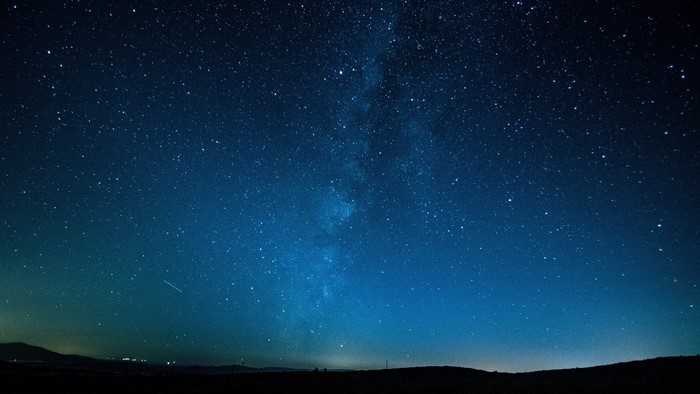 Night sky with stars and horizon