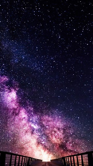 Starry Night Sky over a Bridge