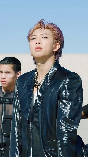 RM from BTS in ON music video
