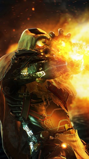 Outriders character firing a fiery blast