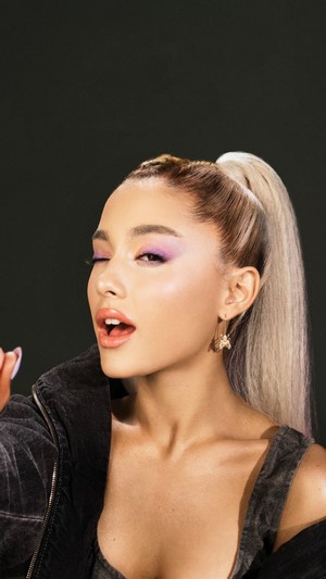 Ariana Grande winks