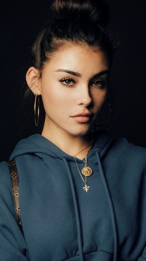 Madison Beer in a blue hoodie