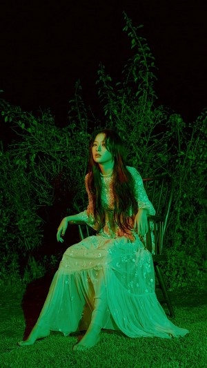 Seulgi from Red Velvet in a garden