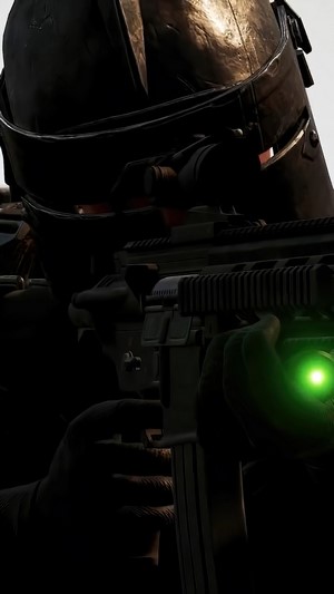 Soldier aiming a rifle with a green laser sight