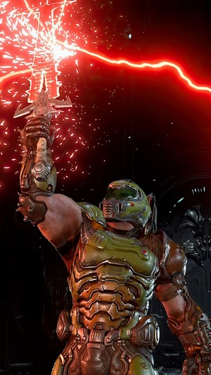 Doomguy from DOOM Eternal holding a glowing sword