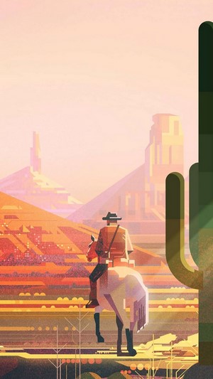 Cowboy on horseback in a desert landscape
