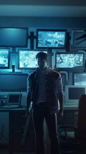Man in a security room with multiple monitors