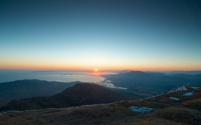 Sunrise over mountains and sea