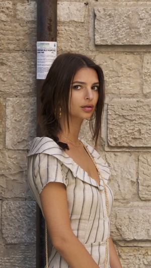 Emily Ratajkowski in a striped dress