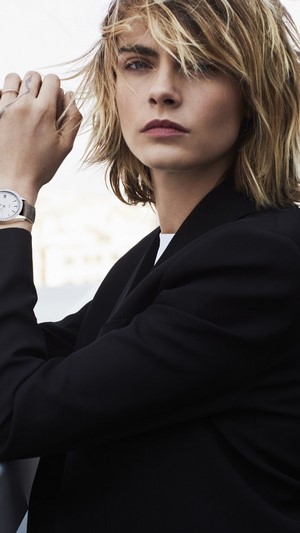 Cara Delevingne wearing a black blazer
