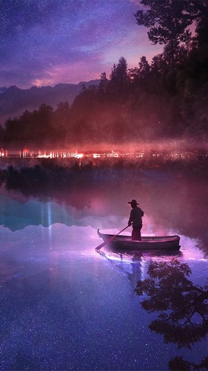 Man in a boat on a starry lake at night