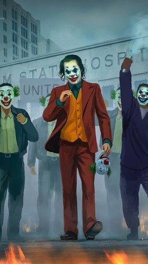 Joker and protesters outside Arkham State Hospital