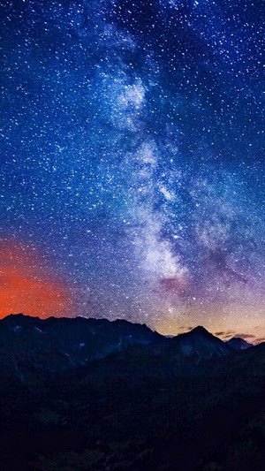 Milky Way over Mountains at Night 4K