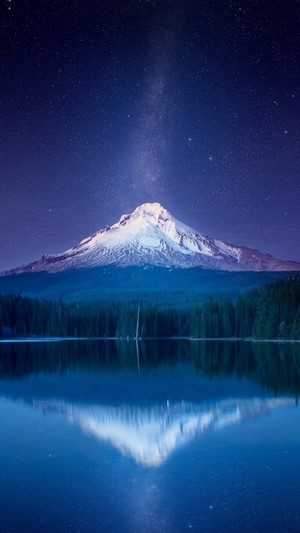 Snowy Mountain Reflecting in Lake Under Starry Night Sky 4K