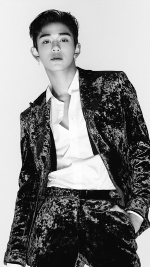 Lucas from SuperM in a velvet suit