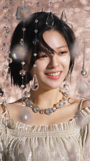 Jeongyeon from TWICE smiling with crystals