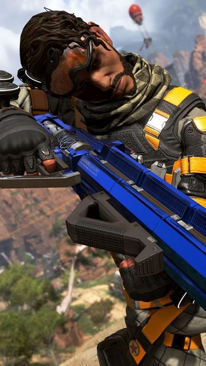 Mirage from Apex Legends holding a blue rifle