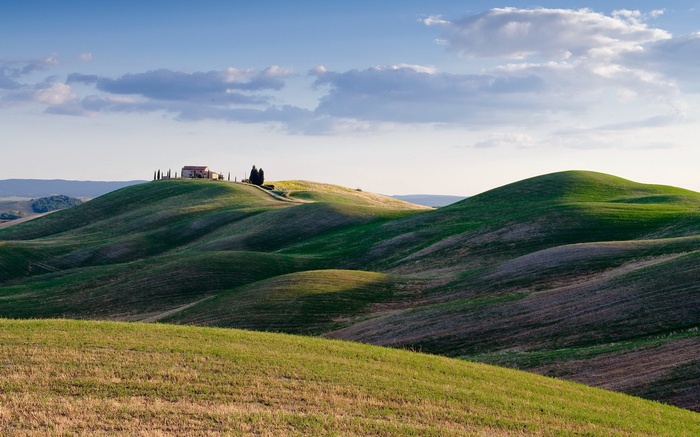 Tuscan Hills with a Farmhouse and Cypress Trees