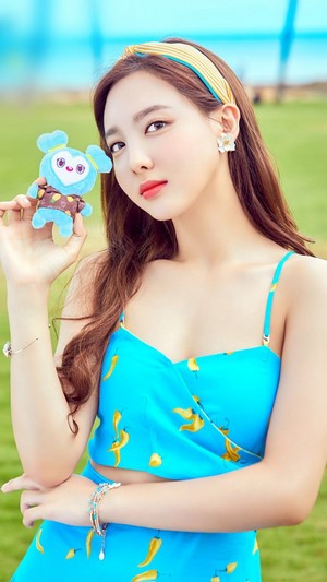 Nayeon from TWICE holding a plush toy