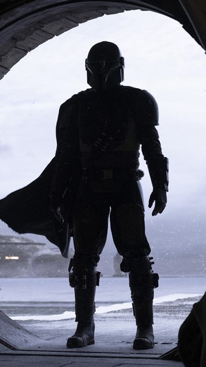 The Mandalorian in a snowy landscape