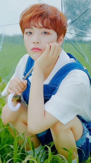 Song Hyeongjun holding an umbrella