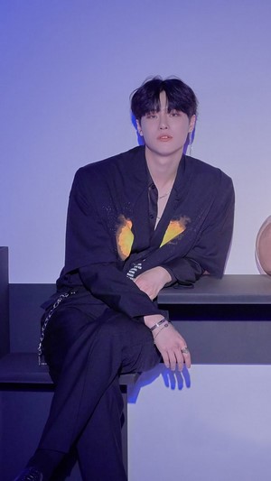 Cho Seungyoun in black shirt with flame print