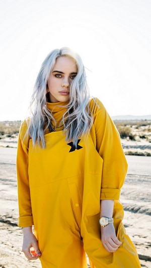 Billie Eilish in yellow jumpsuit