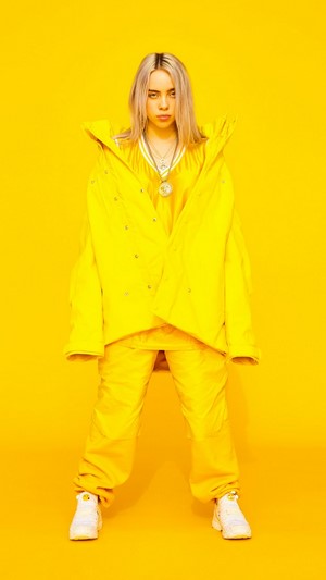 Billie Eilish in yellow outfit